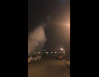 Guy tiger costume holding firework on pelvis shoots into air