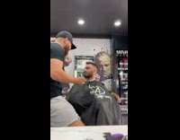Barber sits on clients lap prank 