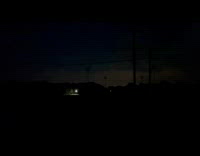 Lightning strike flicker behind the dark clouds