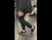 People Raise Feet as Rat Runs Around Train