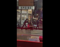 NYPD pushes elderly person in wheelchair 