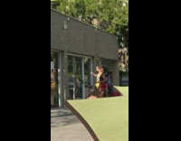 Two girls dance tiktok store glass window