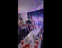 Guy throws friend on folding table to break it party