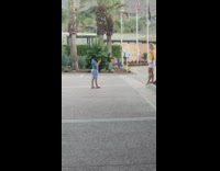 Blue shirt kid photographs yellow shirt mom