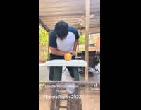 Guy pulls sword and then smashes apple 