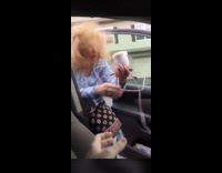 Mom gets pushed out car by wind