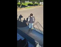 Guy fur jacket boots slips skate park half pipe 