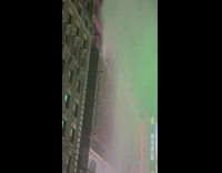 Water Bursts Out Upwards from Building Nearby