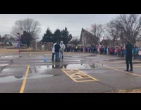 Bottle rocket launces to the air and shoots in the basketball ring