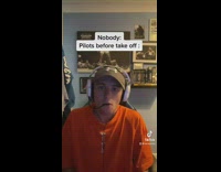 Guy puts microphone in mouth pilots before takeoff 