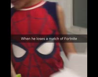 Little boy in spiderman shirt yells its not funny at camera