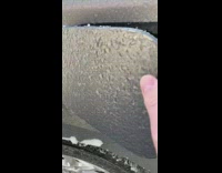 Man punch to open frozen car charger door