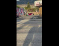 Four women pink outfit parking lot photoshoot