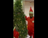 Christmas tree rides subway with the elf