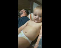 Baby cusses in diapers 