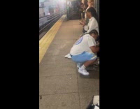 Woman cuts dog hair at train station part 1