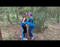 Two men spins and wraps rope on their body