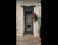 Girl bounces ball golf club hits face 