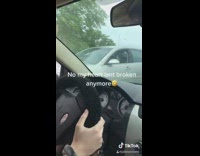 Woman pink windshield wiper angry break 