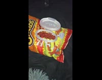 Hot cheeto bag with huggies diaper lid