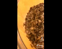 Guy eating cocoa pebbles out of bowl with broken fork