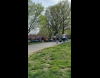 Collab WINY - Man ride bike trash can on head