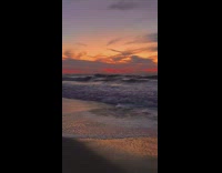 Beach sunrise sunset orange red sky waves