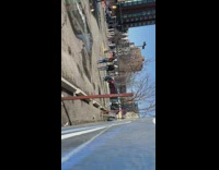 Four people guy throws rock at puddle