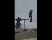 Girl black hat snow line control rope 