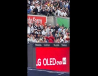 Man singing and dancing at stadium