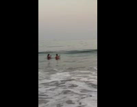 Two girls deep water risky selfie waves