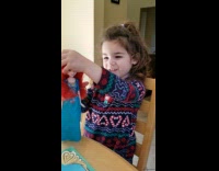 Girl sings Uptown Funk with doll