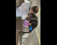 man pink shirt pic private plane