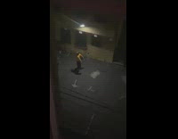 Man yellow sweater tiktok dance dark alleyway