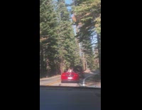 Woman white dress sit red convertible car