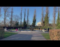 Two women sits by the fountain for a different photoshoot
