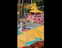 Two guys on unicorn floaty 