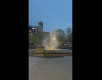 Guy does backbend over fountain