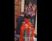 Collab BitchIG2 - Nerf gun guy chair shot in back