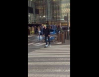 Joker spotted casually skateboarding cross the street