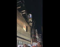 Girl stands on car roof for photo