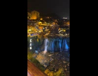 Man films waterfalls view from Furong China