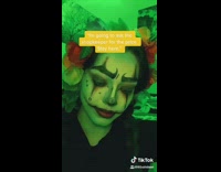 Girl lip syncs clown makeup flower crown 