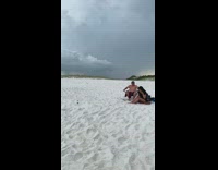 Shirtless man flex muscles lightning in the background