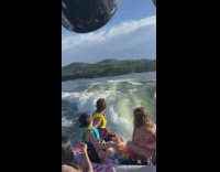 Guy flips while doing a stunt on jetski