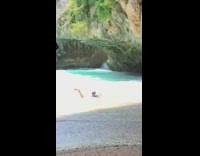 Man swim beach waves action camera