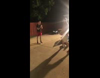 Son tries to play fight with dad in backyard, trips on toy electric car 