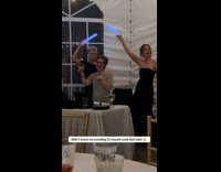 DJ dance with guest at the wedding