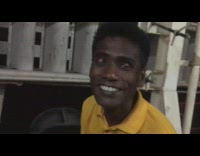 Yellow shirt guy closes eyes flips eyelids 