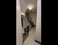 Rain pours from roof ceiling inside apartment 